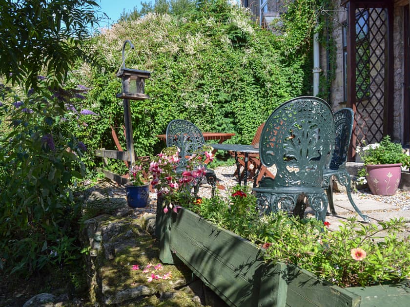 Sheltered and sunny sitting out area | Wood Cottage, Buxworth, High Peak