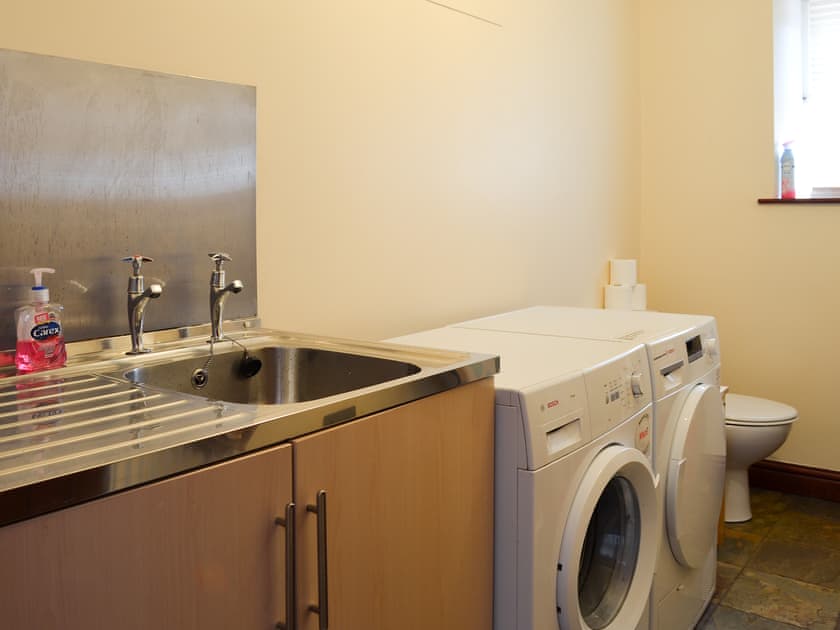 Practical utility room with laundry facilities | Wood Cottage, Buxworth, High Peak