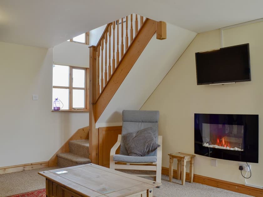 Comfortable living room | The Stables - Smiths Farm Cottages, Charmouth, near Lyme Regis