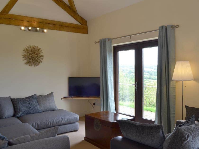 Comfortable living area | The Barn - Smiths Farm Cottages, Charmouth, near Lyme Regis