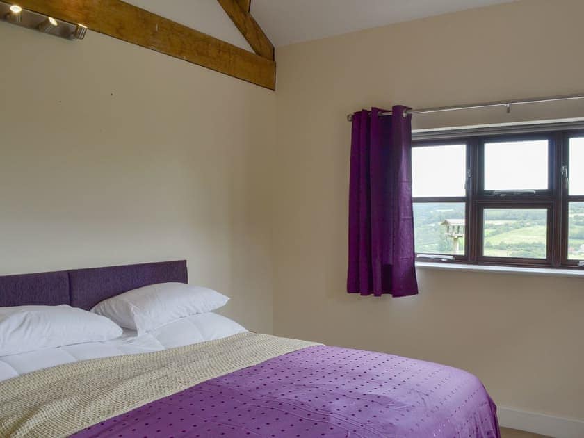Double bedroom with zip and link super kingsize bed (can be twin beds on request)  | The Barn - Smiths Farm Cottages, Charmouth, near Lyme Regis