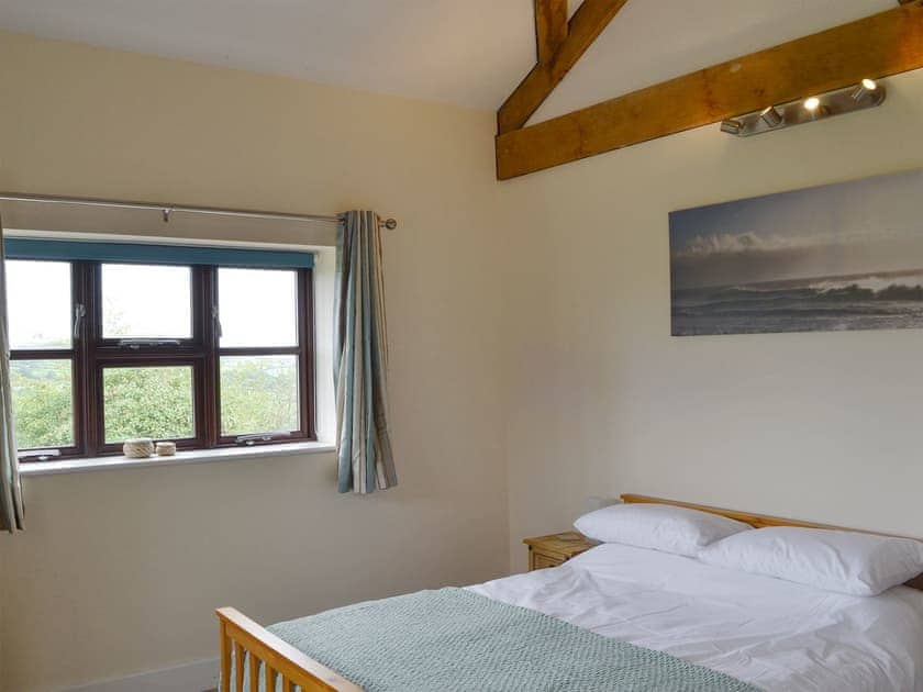 Double bedroom with kingsize bed and en-suite | The Barn - Smiths Farm Cottages, Charmouth, near Lyme Regis