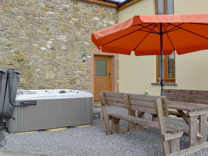 Hot tub and sitting out area | Bwthyn Y Mynach, Nantgaredig, near Carmarthen