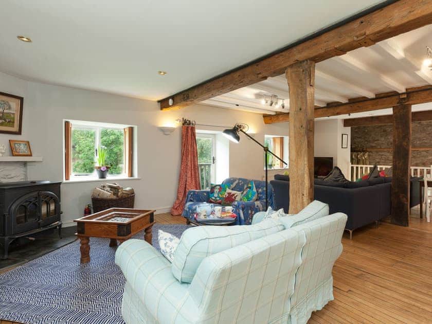 Charming living room with multiple seating areas | Rhydleos Mill, Llansilin, near Oswestry