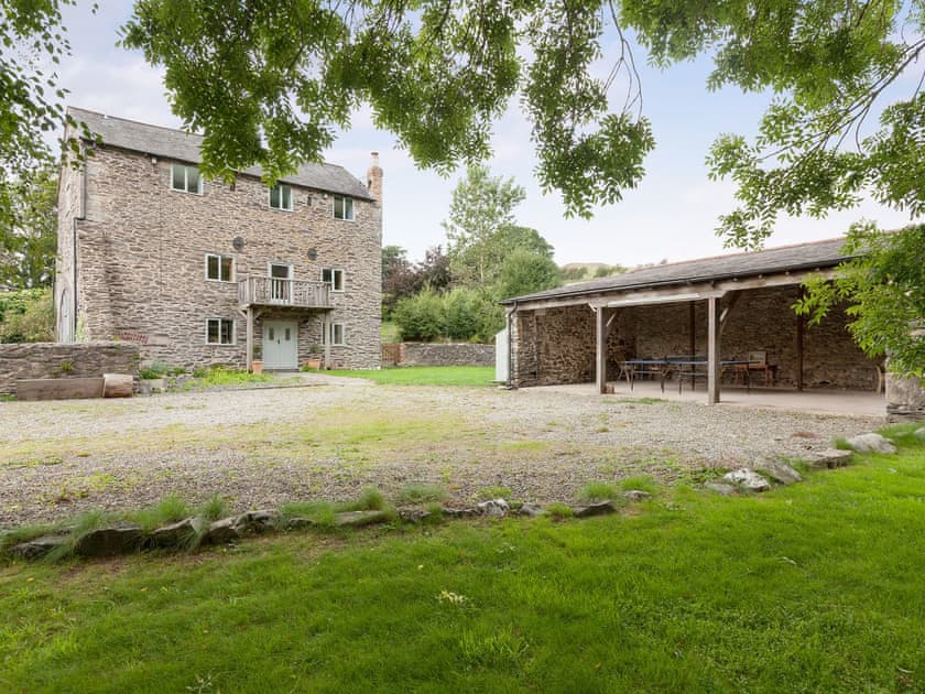 Large gravelled parking area with covered games area | Rhydleos Mill, Llansilin, near Oswestry