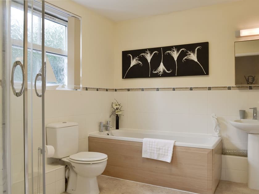 Family bathroom with bath and separate shower cubicle | Rolton House, Ambleside