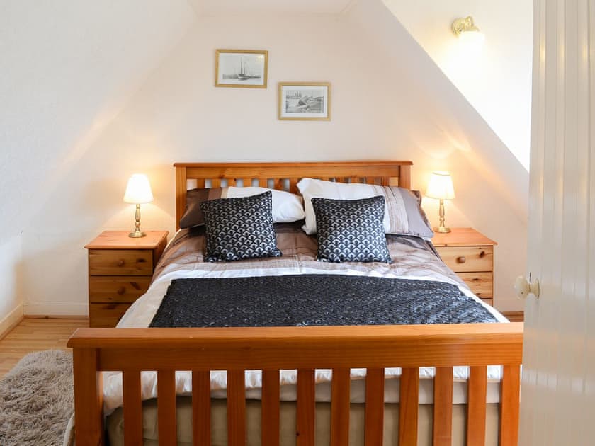 Warm and welcoming double bedroom | Seashell Cottage, Fishertown, Nairn