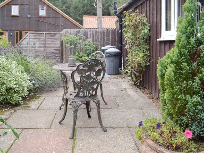 Patio area with outdoor furniture | Pinewood - Thorpewood Cottages, Thorpe Market