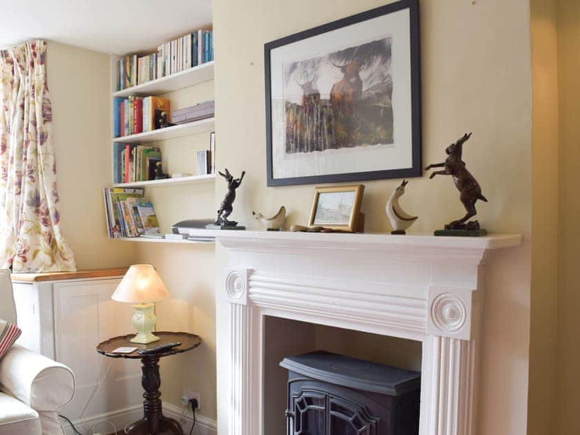 Elegant fireplace in the living room | Coach House Cottage - Coach House Cottages, Yoxford, near Saxmundham