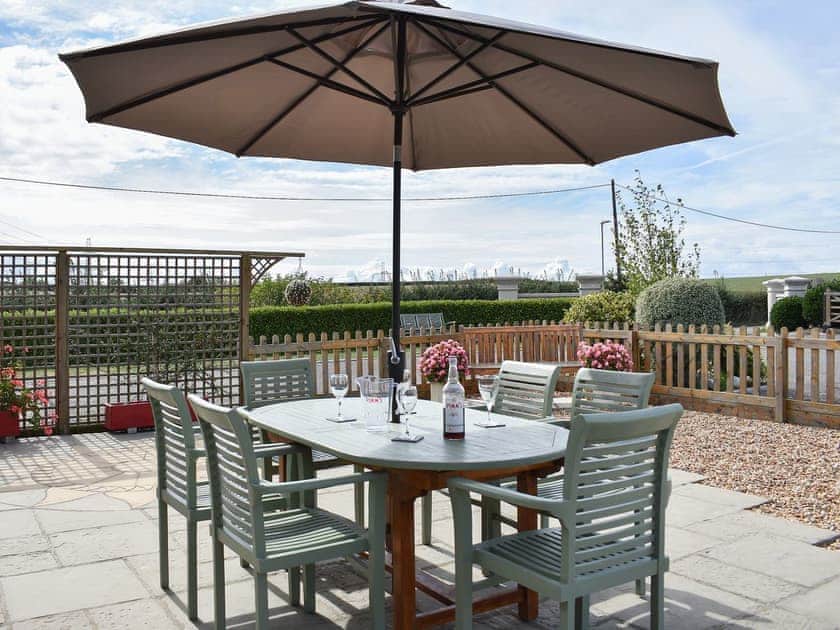 Lovely paved patio area | Magnolia - St Anne’s Cottages, Chickerell, near Weymouth