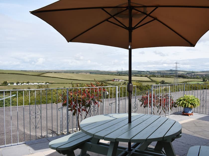 Sit and admire the extensive countryside views | Sunset Cottage - St Anne’s Cottages, Chickerell, near Weymouth