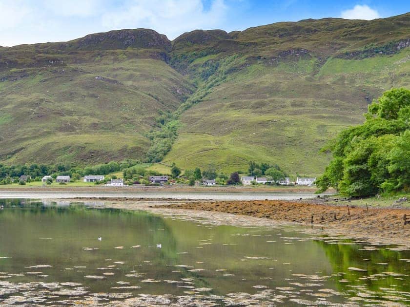 View across the Loch looking towards the property (second building on the right) | Clear Waters, Dornie, near Kyle of Lochalsh