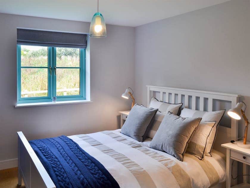 Comfortable bedroom with kingsize bed and en-suite | Eagle Owl Lodge, St Columb Major, near Padstow