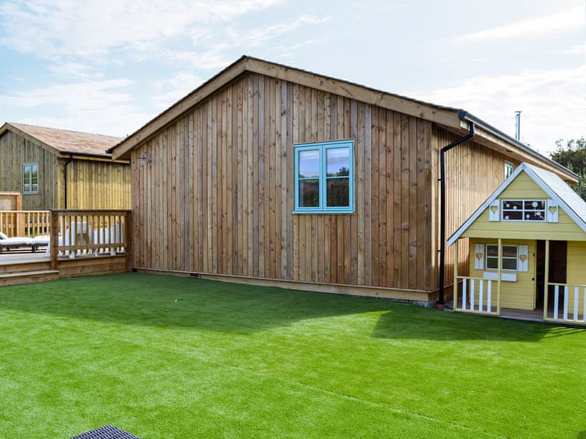 Large, enclosed, artificial turfed garden  | Eagle Owl Lodge, St Columb Major, near Padstow