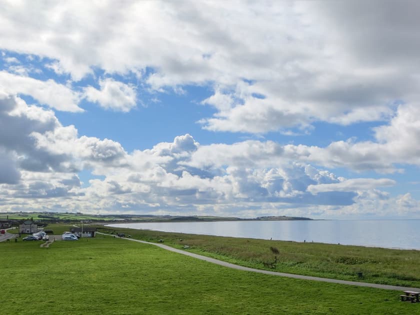 Far reaching views from the bedroom | Seascape Cottage, Allonby, near Maryport