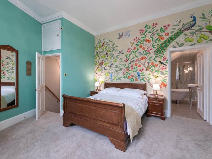 King size bedroom featuring hand painted mural  | The Counting House, Wirksworth, near Matlock