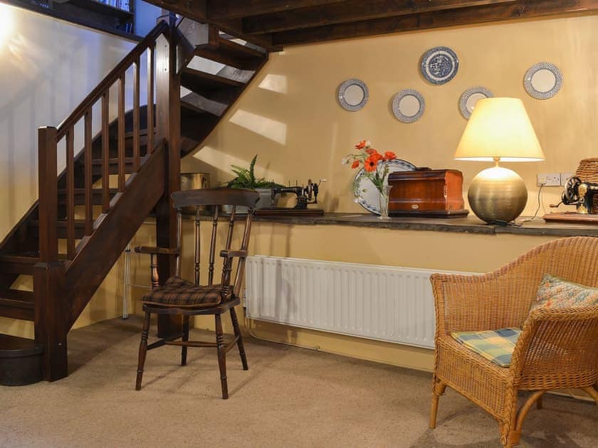 Cosy sitting area in the kitchen/diner | Birkerthwaite Barn - Birkerthwaite Cottages, Eskdale