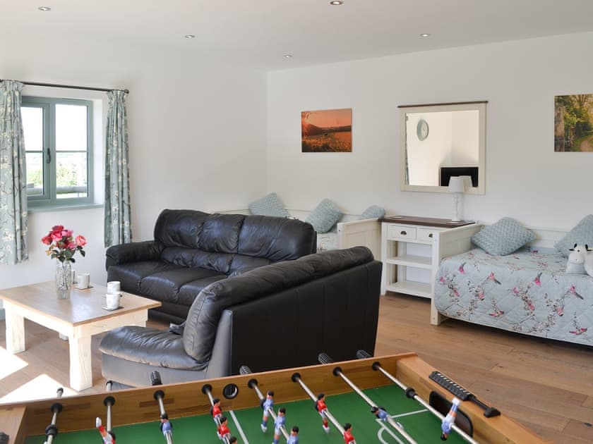 Sitting room with table football | East Croft Barn, Halwill, near Holsworthy