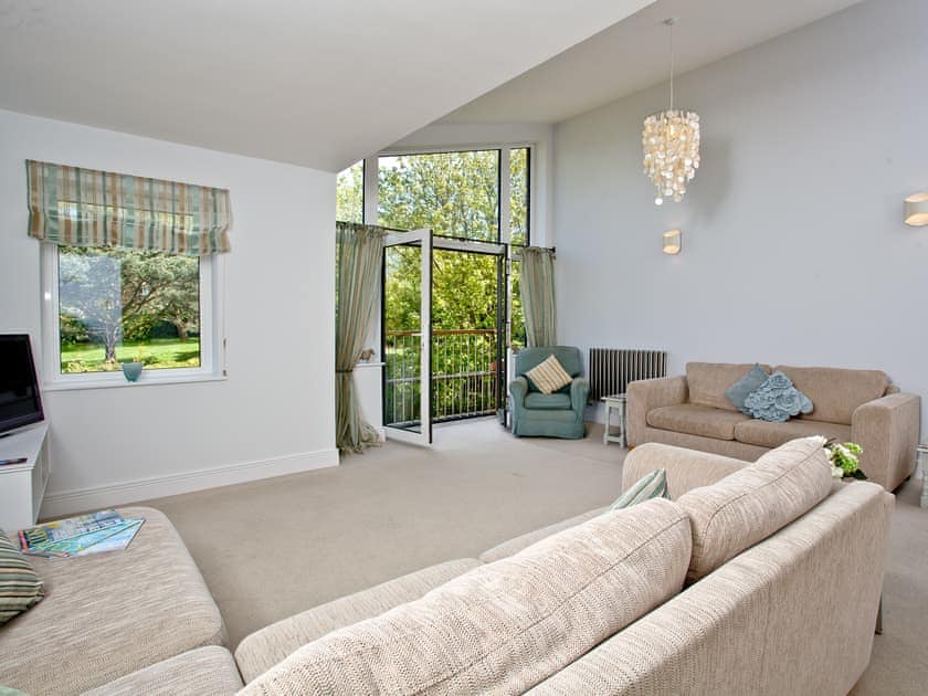 Lovely and airy living area overlooking the gardens | Nothe View - Admirals Quarter, Weymouth
