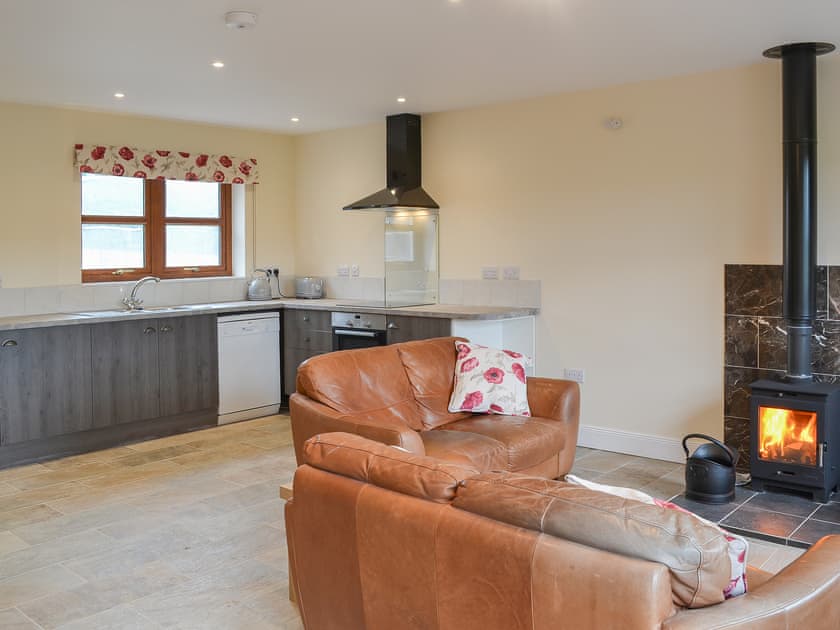 Delightfully cosy living room and adjacent kitchen area | Quails Nest, Edlingham, near Alnwick
