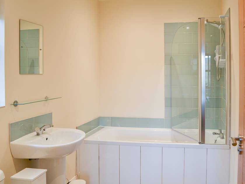 Well appointed en-suite bathroom with shower over the bath | Quails Nest, Edlingham, near Alnwick