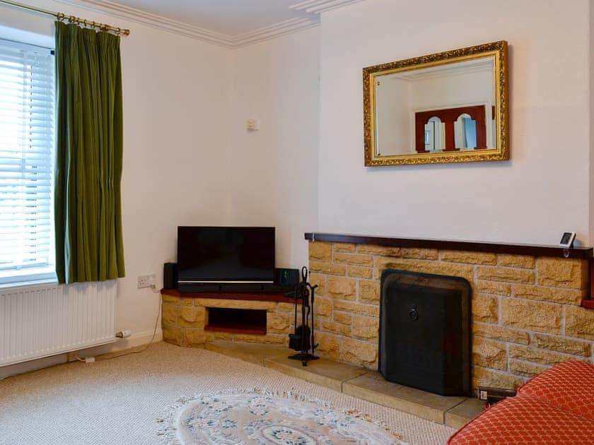 Relaxing living room with open fire | Derwent View, Setmurthy, near Bassenthwaite