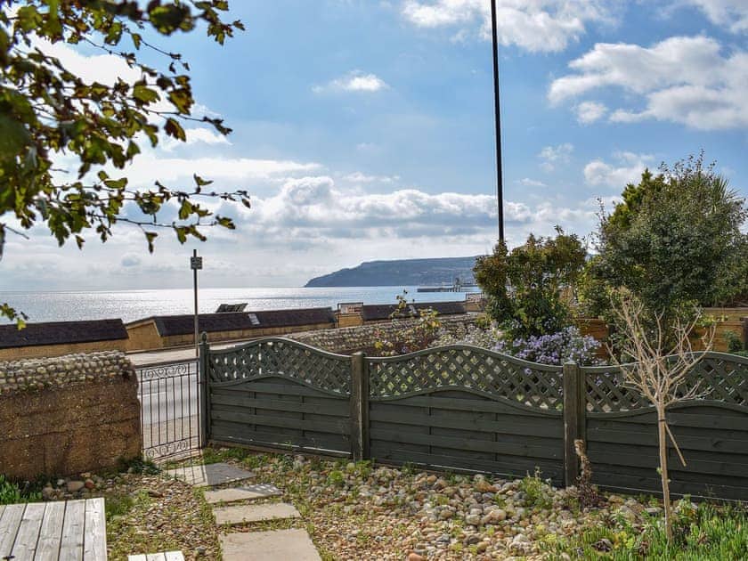Private front garden just a short hop from the beach | Little Lismoy, Sandown