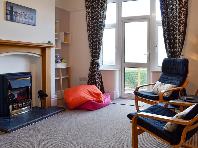 Second sitting room with door to the garden | Zonnebloem, Brymbo, near Wrexham