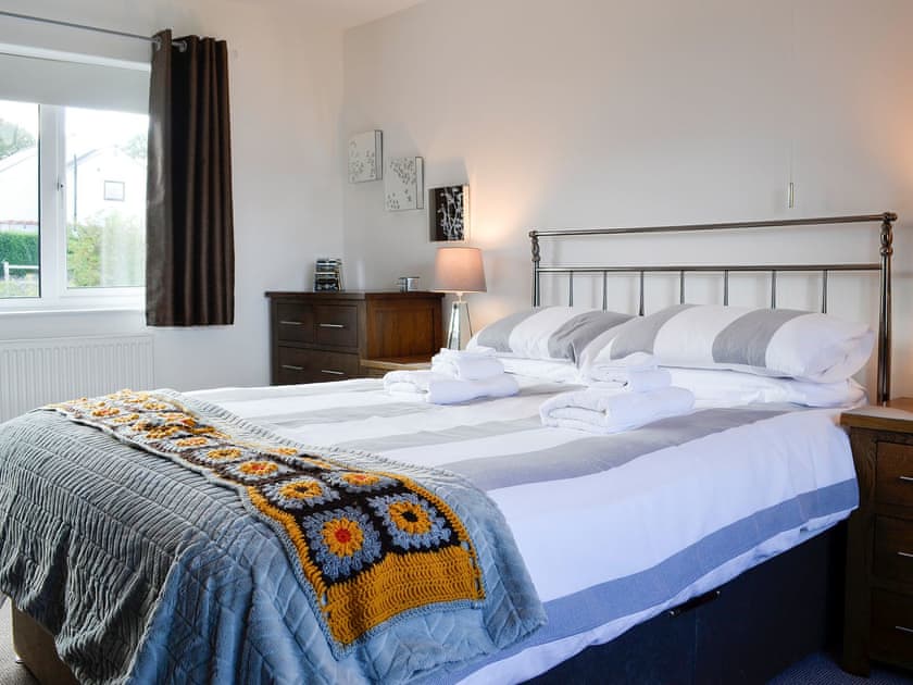 Charming double bedroom with antique style bed | Zonnebloem, Brymbo, near Wrexham