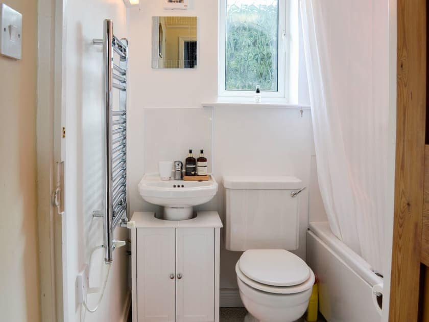 Bathroom with shower over the bath | Zonnebloem, Brymbo, near Wrexham