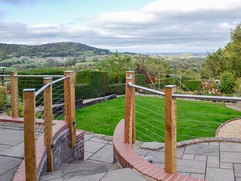Sweeping stairs from the terrace to the lawned garden | Zonnebloem, Brymbo, near Wrexham
