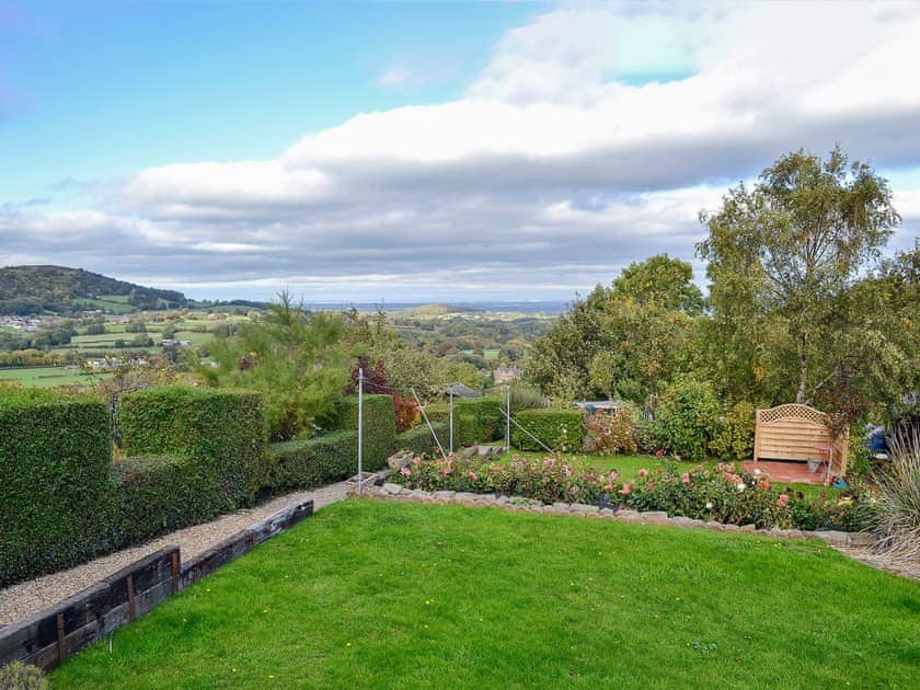 Mainly lawned garden with far reaching views | Zonnebloem, Brymbo, near Wrexham