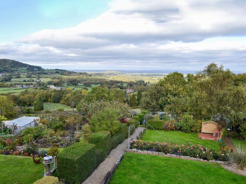 Mainly lawned garden with far reaching views | Zonnebloem, Brymbo, near Wrexham