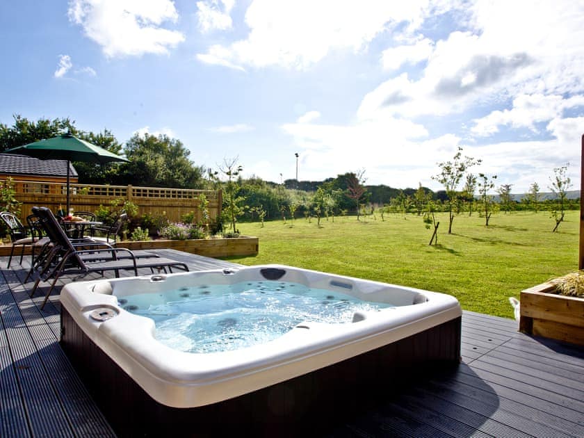 Private hot tub with a wonderful view | Holly Lodge - South Downs Lodges, Hassocks