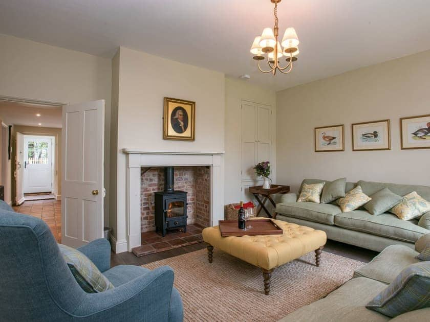 Living room with wood burner | Estate Cottage, Worstead, near North Walsham