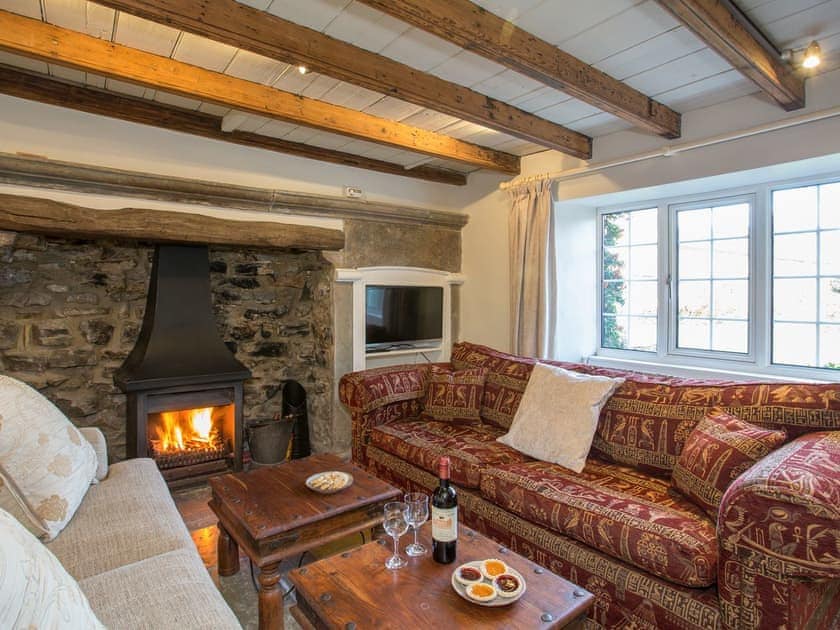 Cosy living room with wood burner | Lyndhurst Cottage, Carlton-in-Coverdale, near Leyburn