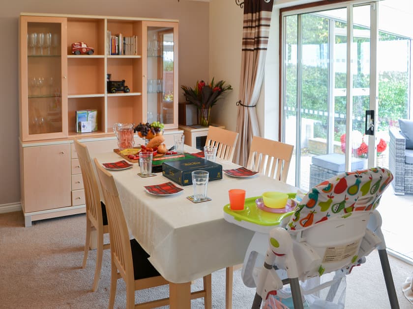 Dining room with patio door to conservatory | Hawthorne House, Amble, near Warkworth