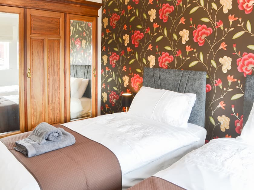 Twin bedroom with built-in storage | Hawthorne House, Amble, near Warkworth