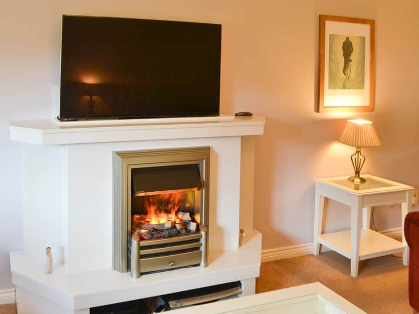 Delightful contemporary fireplace | Hawthorne House, Amble, near Warkworth