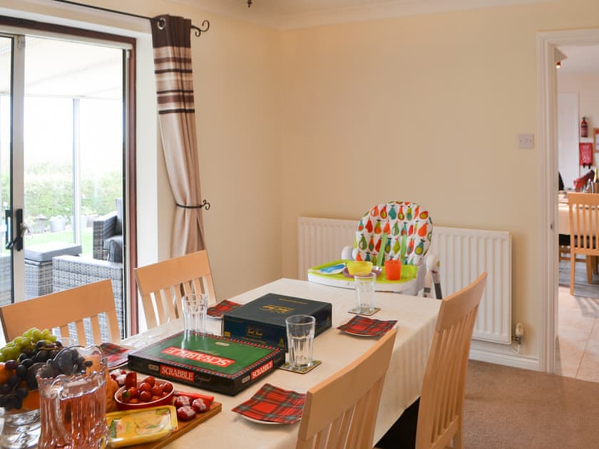 Dining room with access to the sun room | Hawthorne House, Amble, near Warkworth