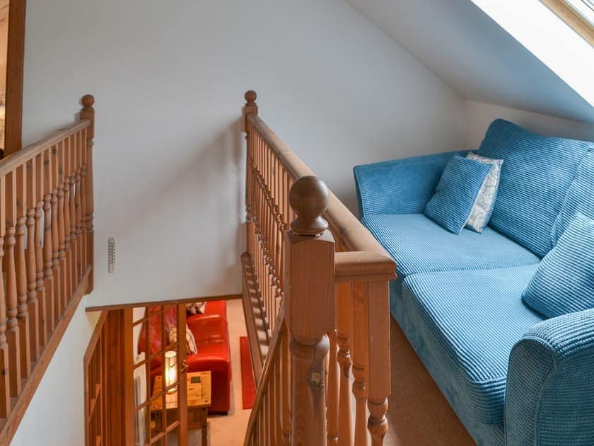 Light and airy landing with seating area | Croftside House - Allt Mor Cottages, Aviemore