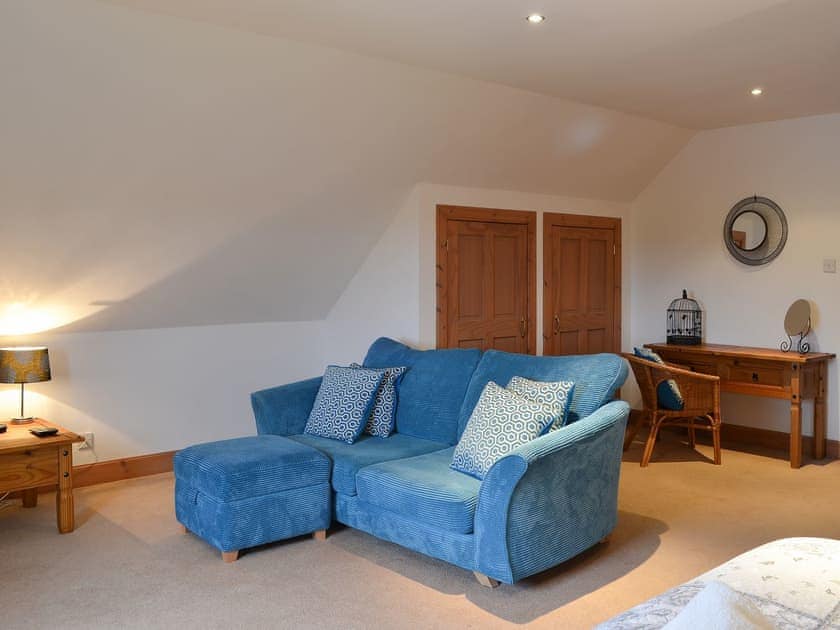 Seating area and writing table in the double bedroom | Croftside House - Allt Mor Cottages, Aviemore