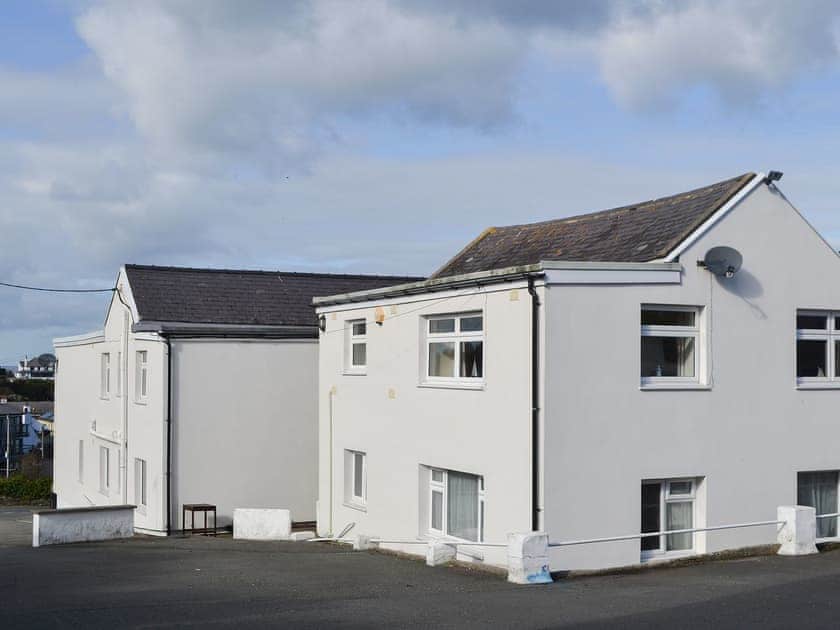 Quayside is located at the rear of the building on the first floor.  There is ample private parking space | Quayside, Cemaes Bay