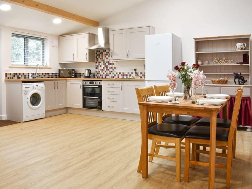 Dining area and adjacent kitchen | Sid’s Place, Ringwood