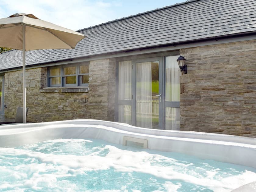 Private hot tub | Ty Llo - Tanylan Farm Cottages, Kidwelly