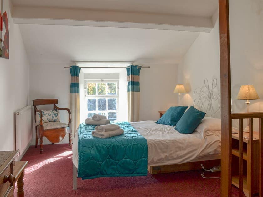 Comfortable bedroom with a double and single bed | Cosy Nook, Ambleside