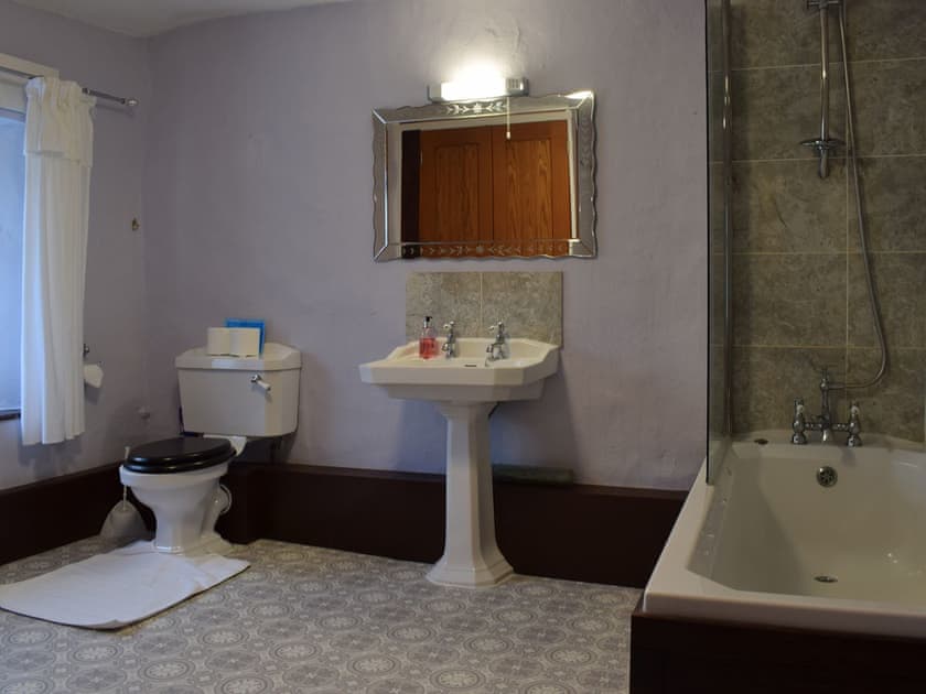 Bathroom with shower over the bath | Oak Cottage - Round Hill Farm, Kirkstone near Ambleside