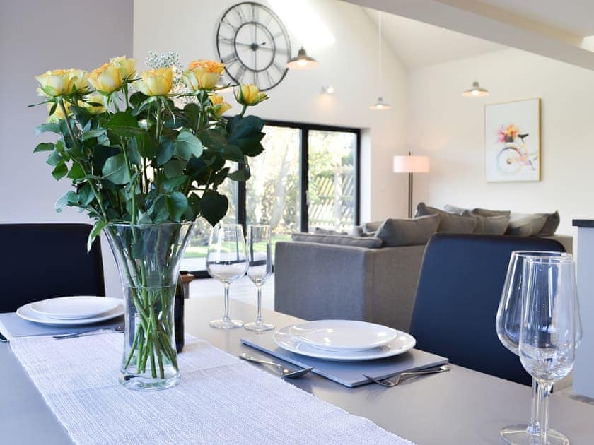 Charming dining area overlooking the garden | The Carriage House - Station House Cottages, Upper Poppleton, near York