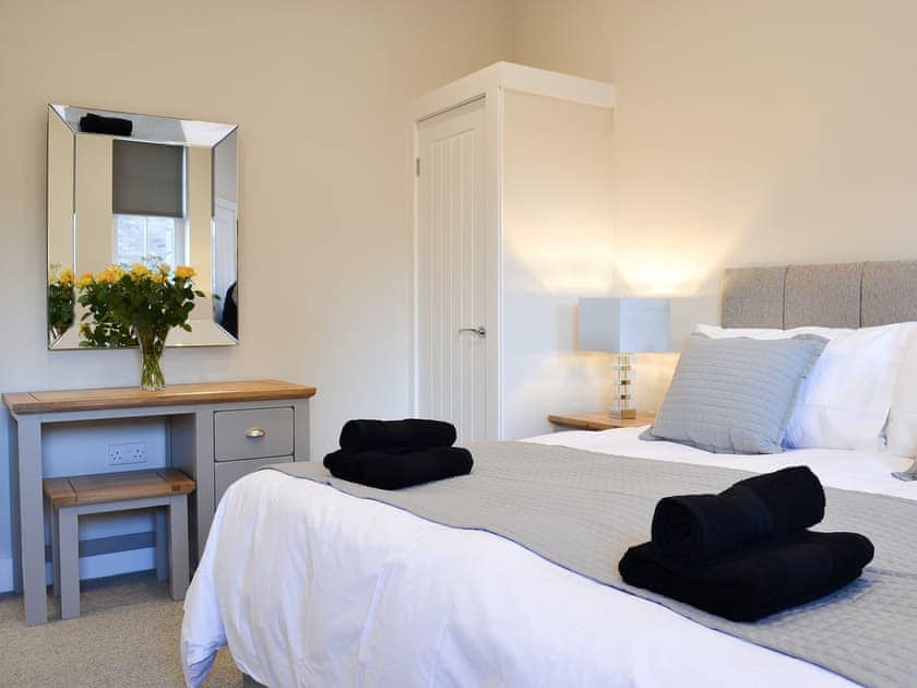 Warm and inviting double bedroom | The Carriage House - Station House Cottages, Upper Poppleton, near York