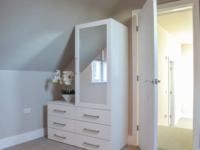 Beautifully appointed first floor bedroom | The Carriage House - Station House Cottages, Upper Poppleton, near York